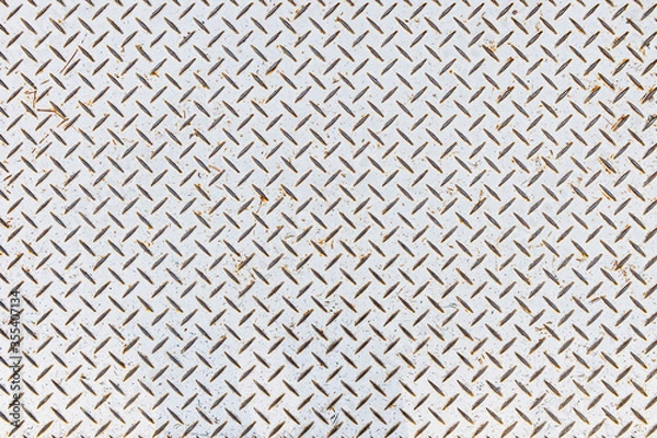 Fototapeta 突起のついた白色の鉄板の表面