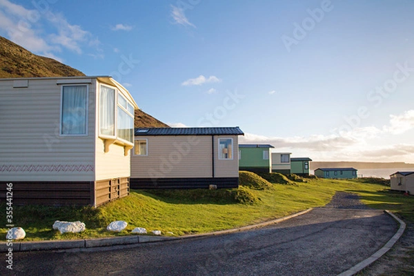 Obraz Static caravan holiday homes at Llangennith on the Gower Peninsular in winter which is out of season, the caravans are closed up until spring.