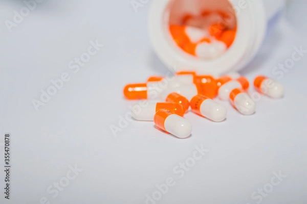 Fototapeta Tablets. Orange capsules.