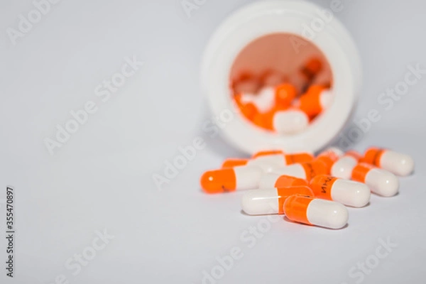 Fototapeta Tablets. Orange capsules.