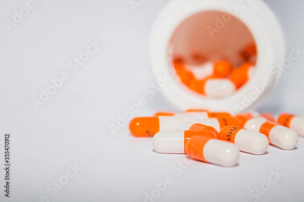 Fototapeta Tablets. Orange capsules.