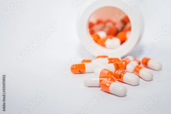 Fototapeta Tablets. Orange capsules.