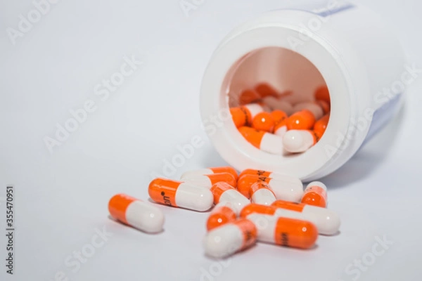 Fototapeta Tablets. Orange capsules.