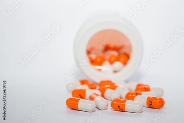 Fototapeta Tablets. Orange capsules.