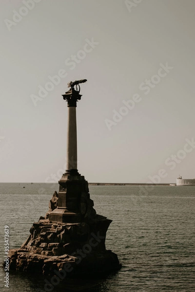 Fototapeta Monument to the Scuttled ships in Sevastopol in summer. Photo in retro style.