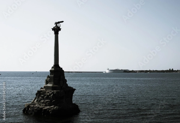 Fototapeta Monument to the Scuttled ships in Sevastopol in summer. Photo in retro style.