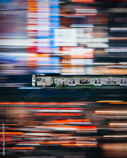 Obraz Retro high speed train on night time with motion blur