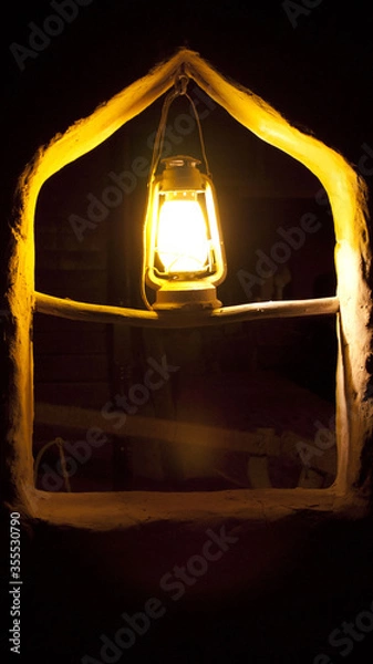 Obraz A lamp in the window 