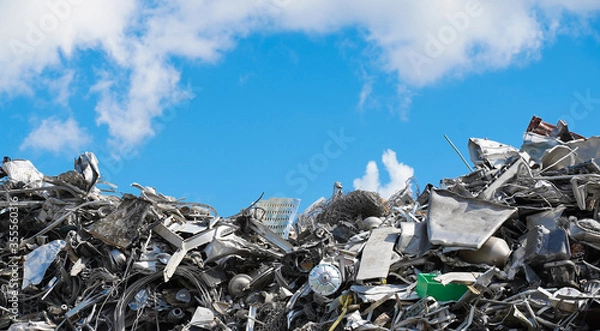 Obraz A lot of aluminum collected for processing on the sky background