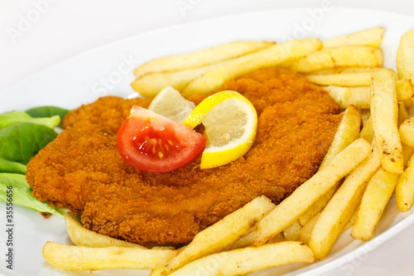 Obraz Paniertes Wiener Schnitzel,Pommes Frites