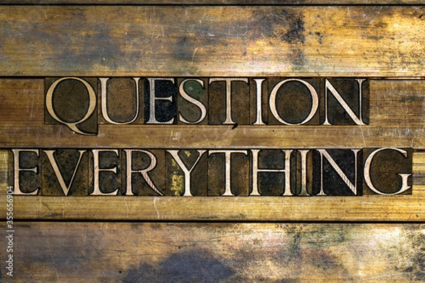 Obraz Photo of real authentic typeset letters forming Question Everything text on vintage textured silver grunge copper and gold background