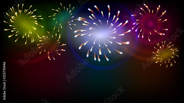 Fototapeta Bright festive fireworks on a dark background. Background for new year party. Shining fireworks with colored rings
