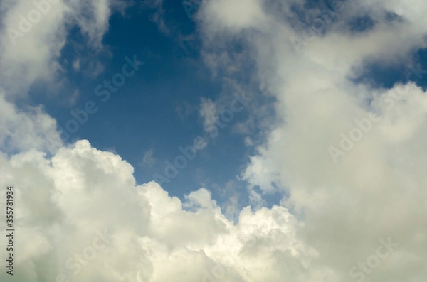 Fototapeta Thick Clouds Over Blue Sky