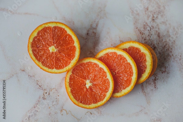 Obraz sliced orange on marble background