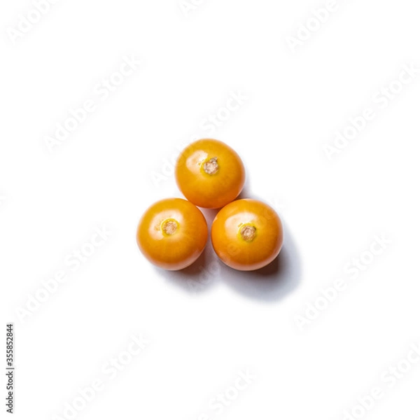 Fototapeta Top down view of three physalis fruits isolated on white background.
