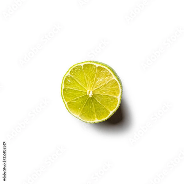 Fototapeta Top down view of a lime isolated on white background.