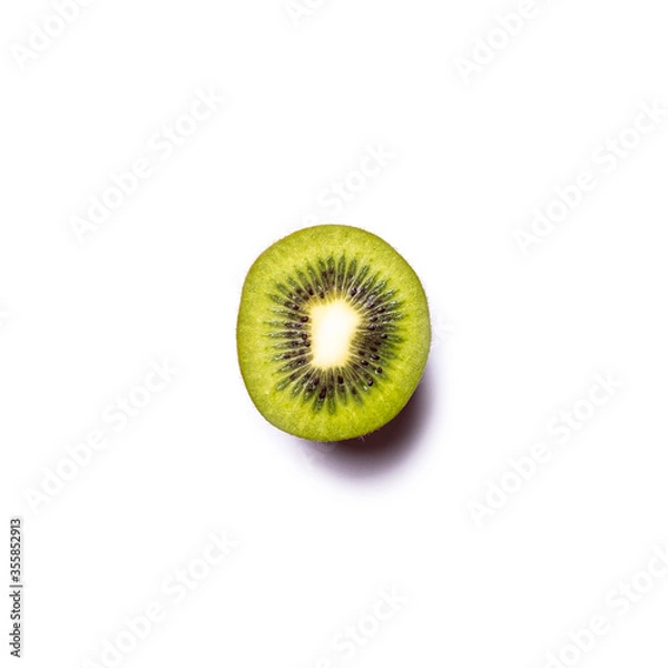 Fototapeta Top down view of a kiwi fruit isolated on white background.