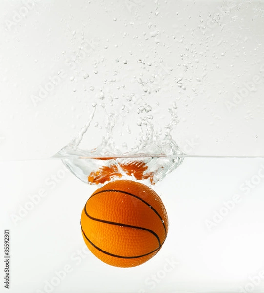 Fototapeta basketball under water with splash isolated on white background