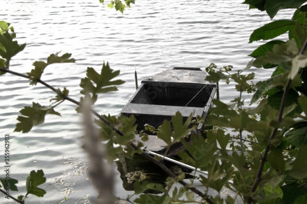 Obraz Ein Boot am Ufer