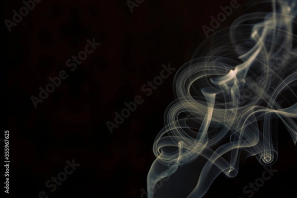 Obraz yellow smoke on black background