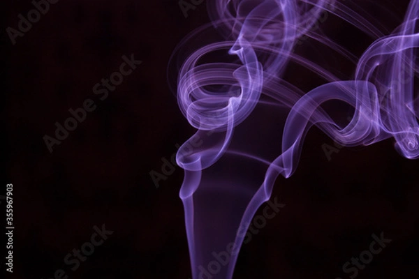 Obraz purple smoke on black background