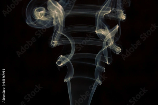 Obraz yellow smoke on black background