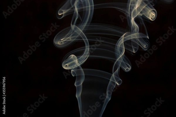 Obraz yellow smoke on black background