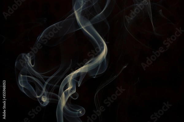 Obraz yellow smoke on black background