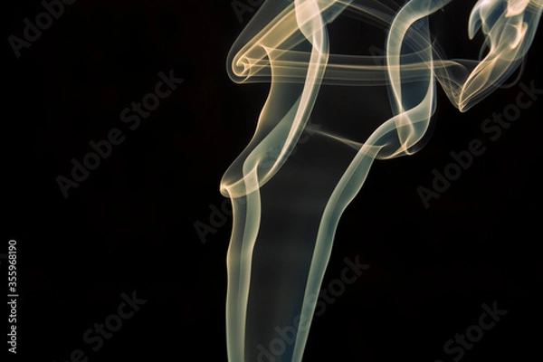 Obraz yellow smoke on black background