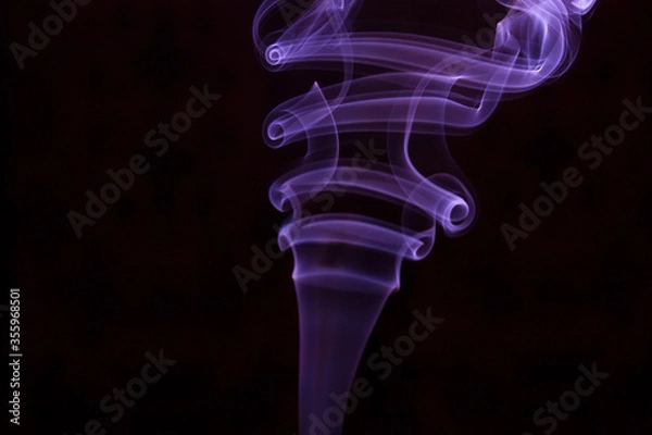 Obraz purple smoke on black background