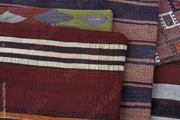 Fototapeta Rugs at an antique flea market in Paris France