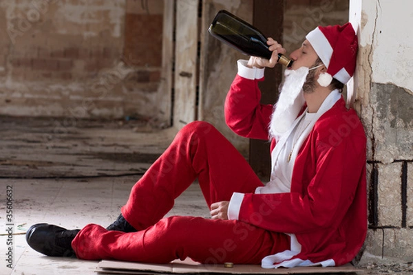 Obraz Alcoholic Santa Drinking a Wine Bottle