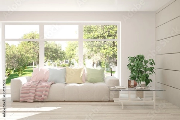 Fototapeta White stylish minimalist room with sofa and summer landscape in window. Scandinavian interior design. 3D illustration