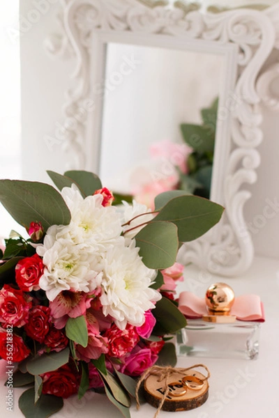 Fototapeta wedding rings and roses