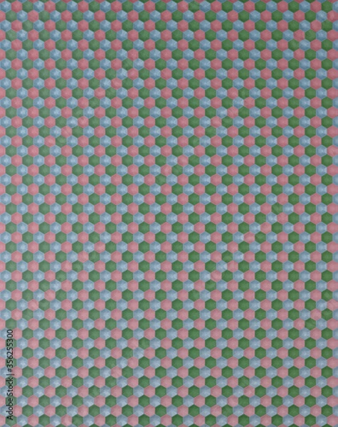 Fototapeta Fragment wielokolorowych płytek ceramicznych do dekoracji ściany i podłogi. Tekstura do użytku w projekcie graficznym i architektonicznym. Wzór ceramicznych płytek o kształcie sześciokąta dla tła. Ilustracja 3D.