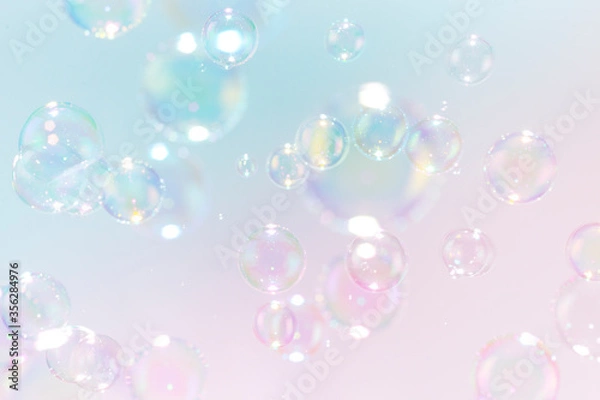 Obraz Beautiful rainbow soap bubbles float as background.