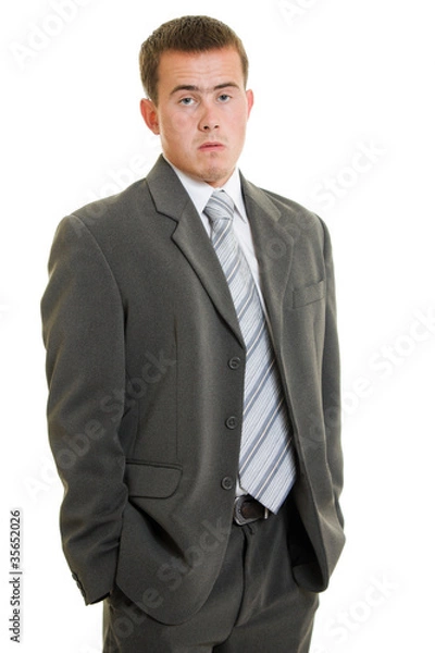 Fototapeta Dissatisfied businessman on a white background.
