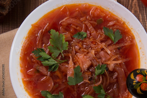 Fototapeta photo for menu, Ukrainian and Russian traditional beetroot soup - borscht with sour cream garlic pepper and sauce, Ukrainian borscht with sour cream, food background, Food and health