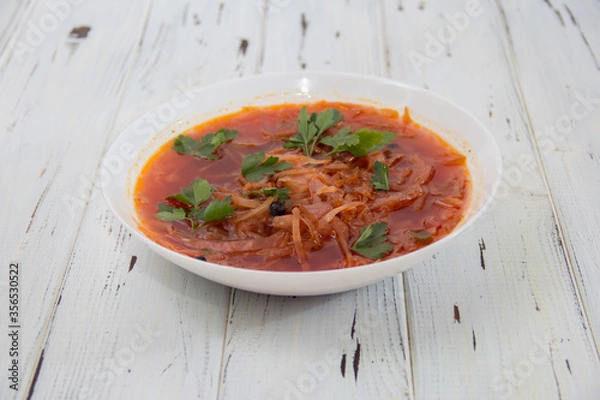 Fototapeta photo for menu, Ukrainian and Russian traditional beetroot soup - borscht with sour cream garlic pepper and sauce, Ukrainian borscht with sour cream, food background, Food and health