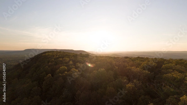 Obraz Drone shot of Delaware water gap PA river national park during summer fall foliage with sunset glare on a side of a mountain 