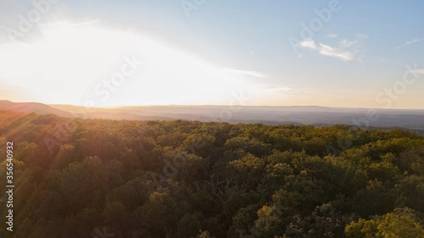 Obraz Drone shot of Delaware water gap PA river national park during summer fall foliage with sunset on the side of forest mountain 