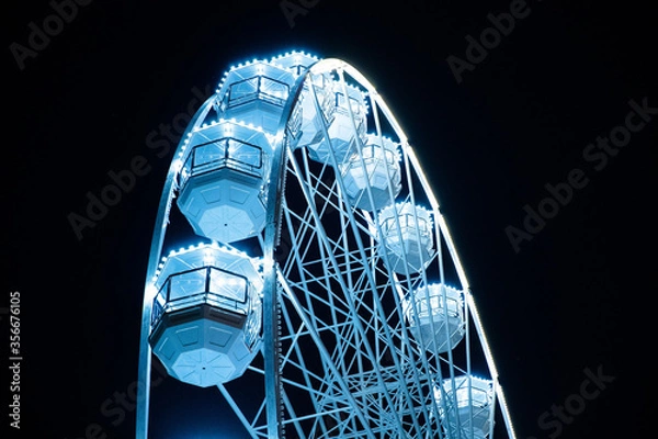Fototapeta Biggest Ferris wheel in Brno, Czech Republic in Moravske square during set up for Christmas event captured at night time