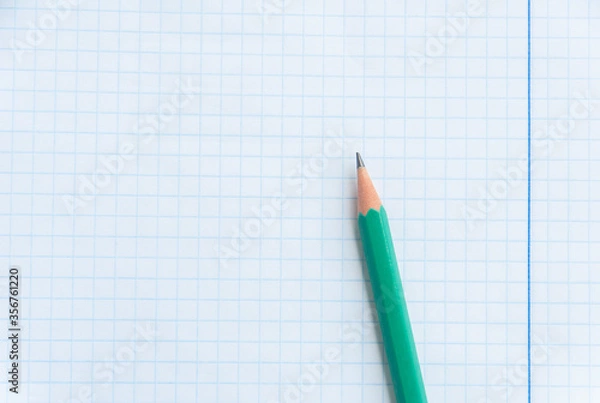 Fototapeta Back to school, education concept. Top view of notebook page and pencil for design a mockup. Education and business concept. Close up. Flat lay. Copy space