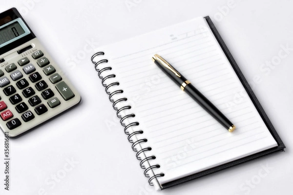 Fototapeta Work space on white desk with equipment office of note book, pen, calculator, Top view and copy space