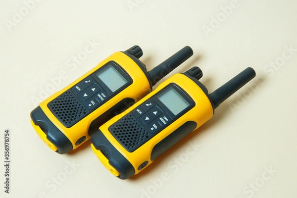 Obraz yellow walkie-talkies on a light background