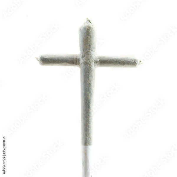 Fototapeta Cross shaped marijuana joint