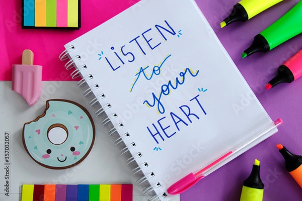Fototapeta Flat lay stylish set. School stationery. Back to school concept. Top view of modern bright school supplies on table. Trendy back to school mock up with handmade motivational quotes.
