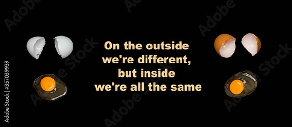 Obraz The phrase: "on the outside we are different, but inside we are all the same.". Dark and light broken chicken eggs and raw white with yolk. Motivational poster against racism and discrimination.