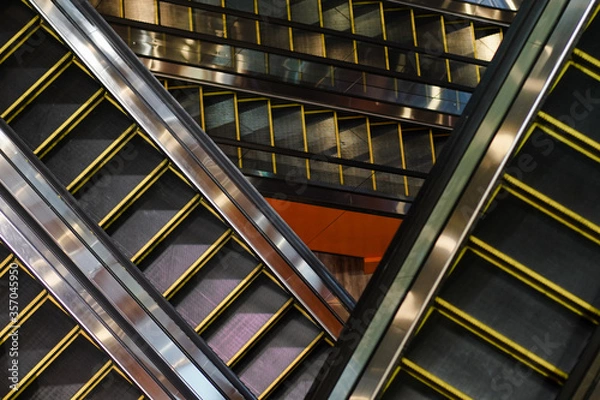 Fototapeta moving escalator in a modern building