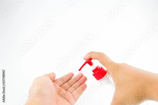 Fototapeta Man washing hands with alcohol gel or antibacterial soap sanitizer after using a public restroom.Hygiene concept. prevent the spread of germs and bacteria and avoid infections corona virus